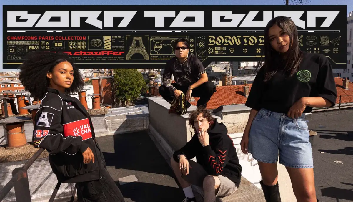 Fyra personer i streetwear står och sitter på ett tak framför en banner med texten "BORN TO BURN"