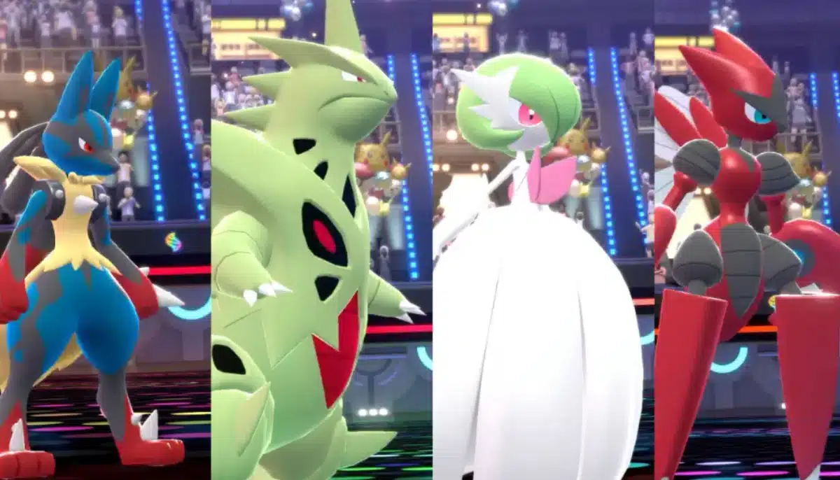 Fyra Pokémon-karaktärer uppställda i arena inför strid med publik och färgglada ljus i bakgrunden.