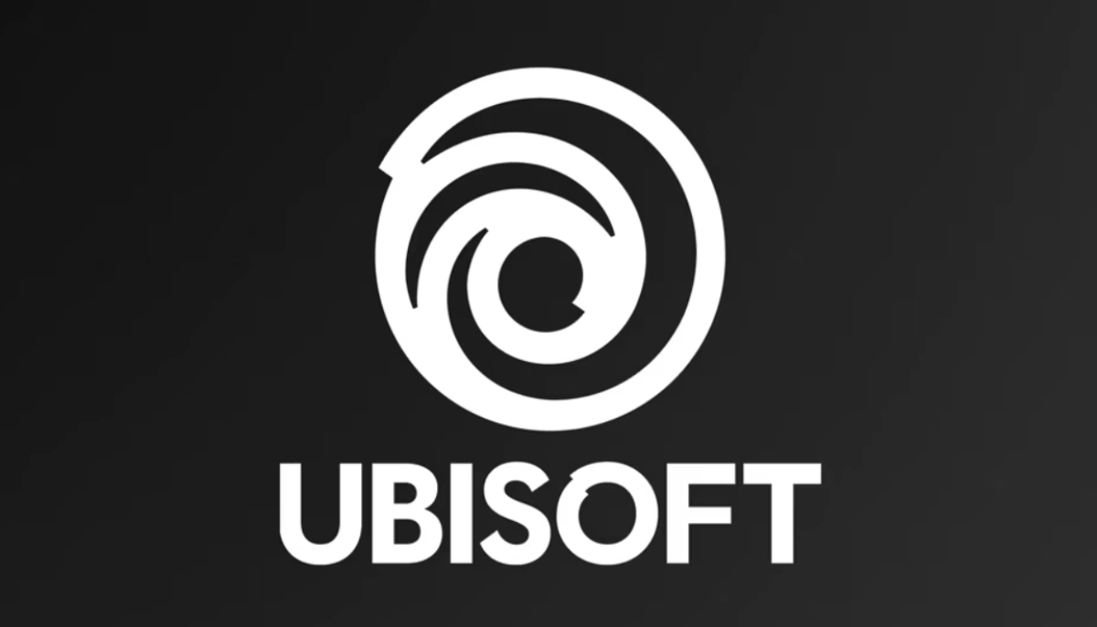 Ubisoft-logotyp i vitt mot mörk bakgrund, symbol för spelutvecklaren.