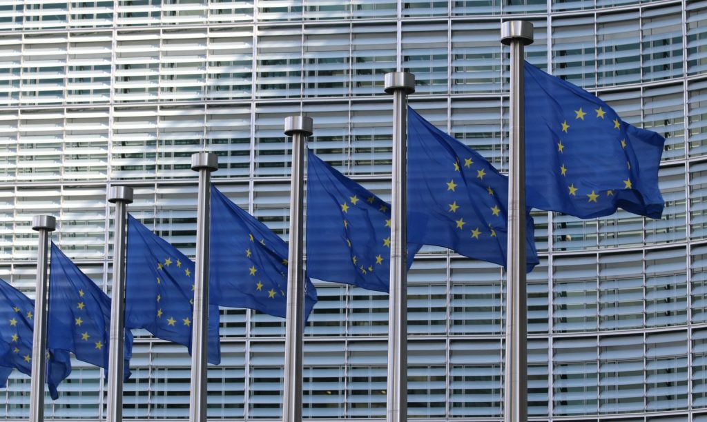Eu Commission flags unsplash Guillaume Périgois