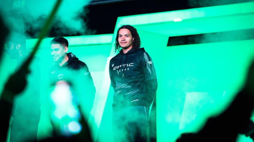 OpTic Texas Huke standing on stage wearing OpTic hoodie
