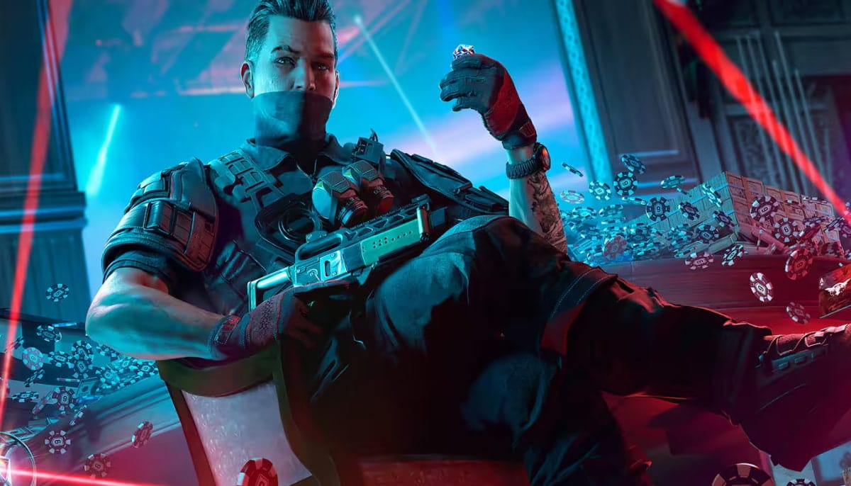 Denari in tactical gear sits confidently with legs crossed, holding a poker chip amidst scattered cards and chips