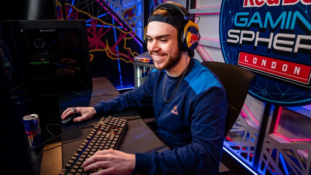 Image of Fortnite player Mongraal playing game while wearing Red Bull headset and jumper.