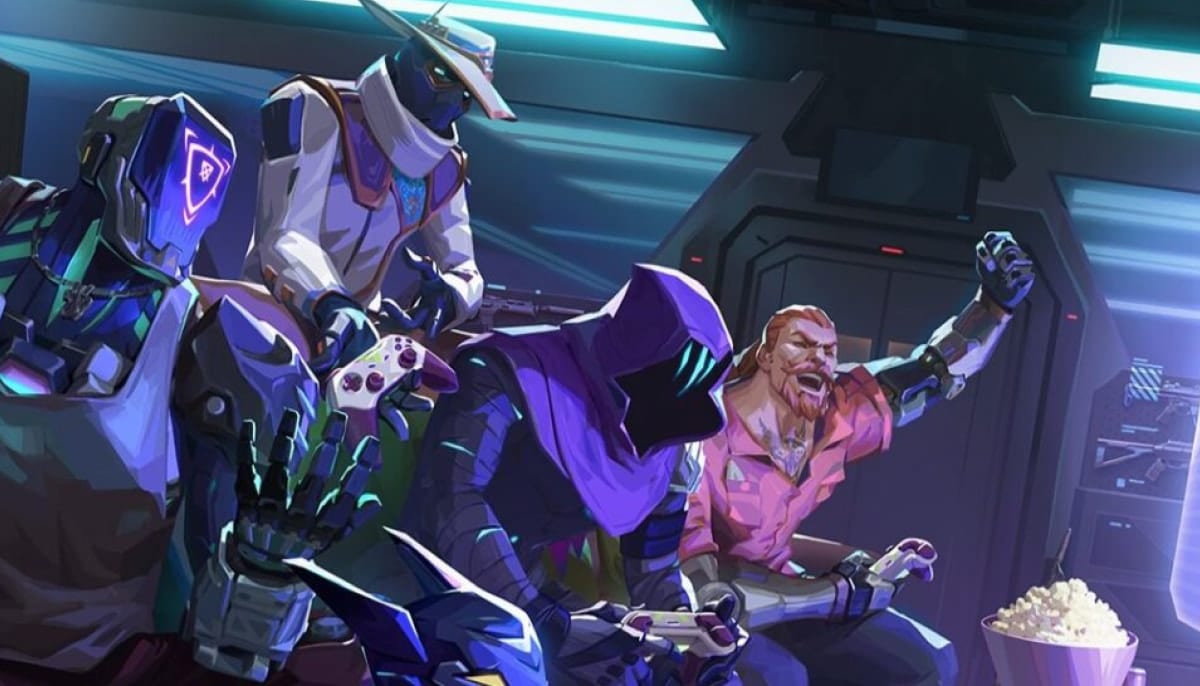 Four VALORANT's characters in futuristic outfits play video games intensely