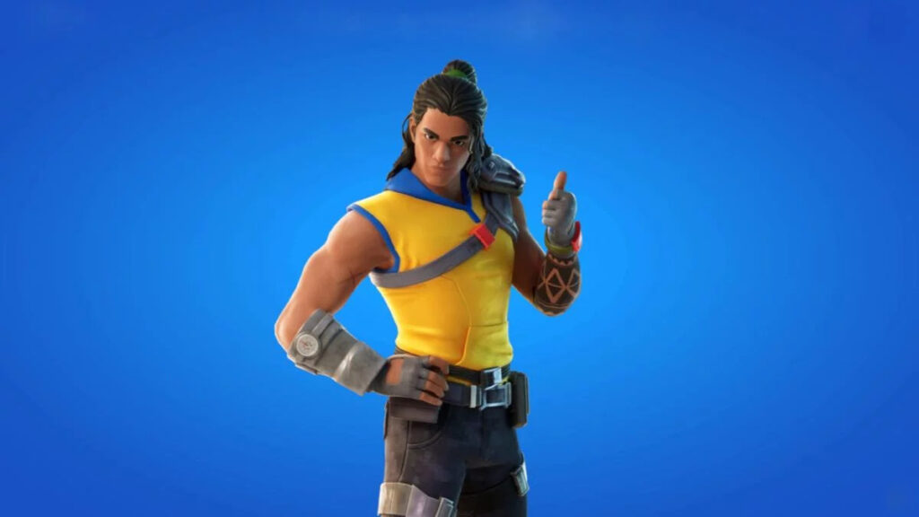 Trailblazer Tai Fortnite skin giving a thumbs-up, wearing a yellow and blue outfit with tactical gear, standing against a vibrant blue background — character render.