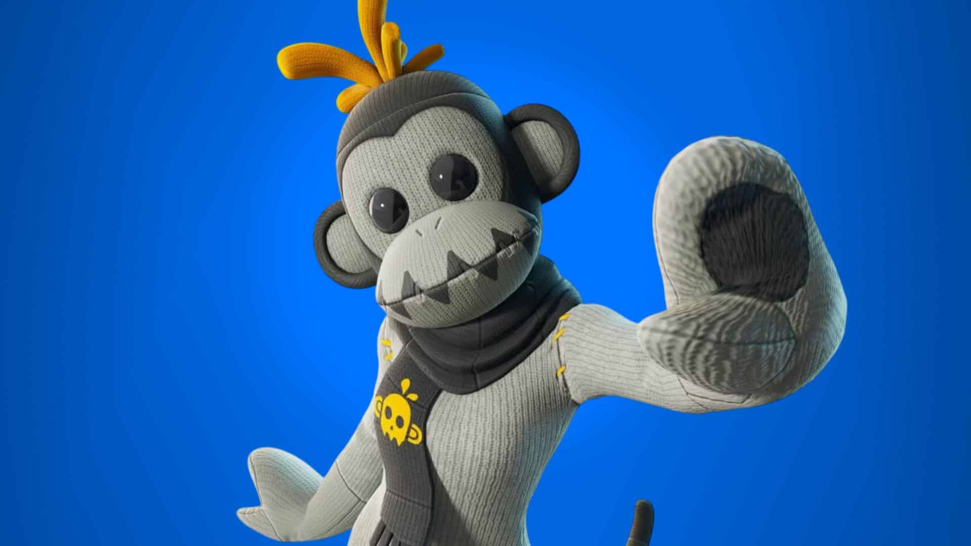 A close-up of the GHOST Monks character in Fortnite, which is a grey sock monkey in a grey scarf with a yellow skull emblem