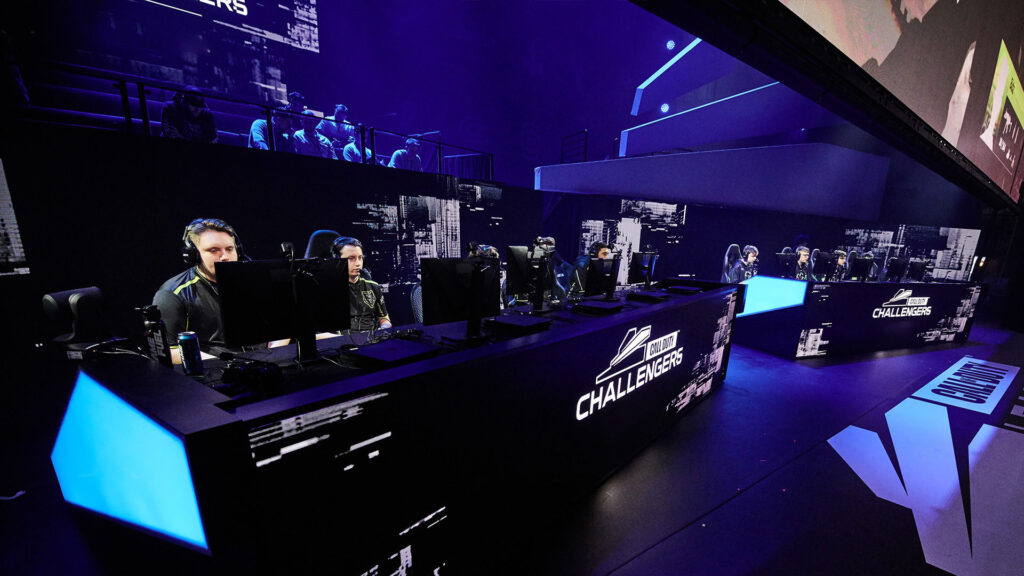 Image of Call of Duty Challengers players competing on stage with branding