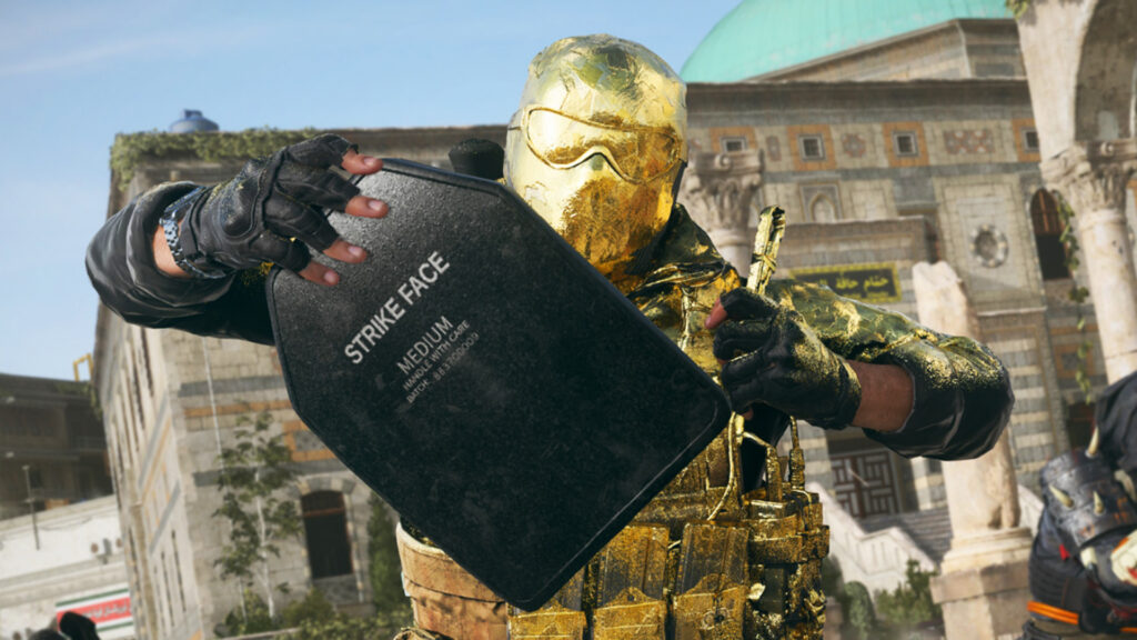 Image of Call of Duty: Warzone player equipping armour plate. The player is wearing a golden helmet and vest