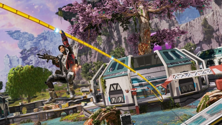 An Apex Legends character sliding on a glowing yellow zipline through the vibrant Broken Moon map, with futuristic buildings, a large purple tree, and floating rocky formations in the background.