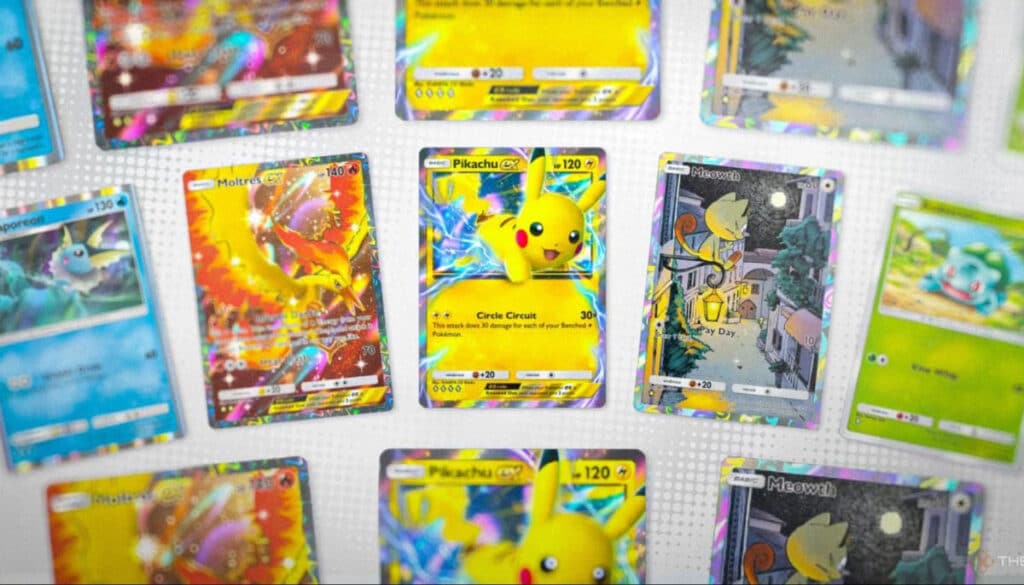 A colorful arrangement of Pokémon trading cards featuring Pikachu, Moltres, Meowth, and Squirtle on a textured background.