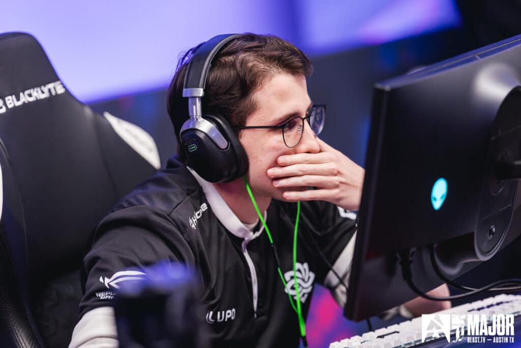 Image of Legacy Counter-Strike player holding hand near mouth while competing at BLAST.tv Austin Major