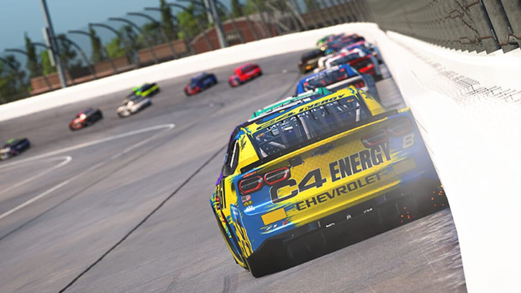 Image of iRacing NASCAR hitting the wall. Other NASCAR cars are racing around a left-hand corner in the background