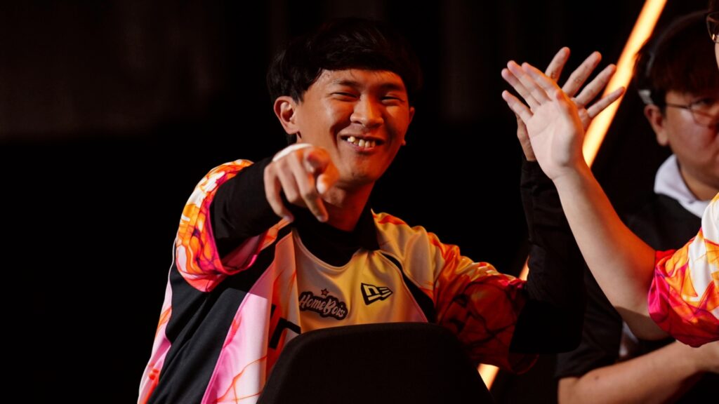 Image of Selangor Red Giants OG Esports player smiling and pointing towards the camera