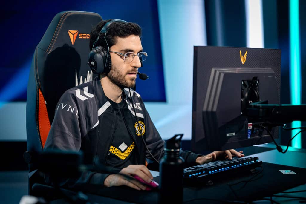 Image of Nisqy competing on League of Legends esports stage while wearing a Team Vitality jersey