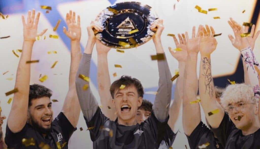 The team proudly displays a trophy, celebrating their achievement with smiles and excitement.