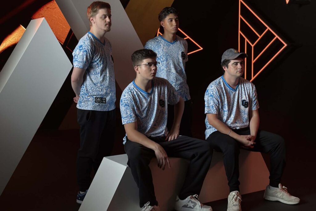 Image of Cloud9 New York roster posing in front of a black, grey, and orange background