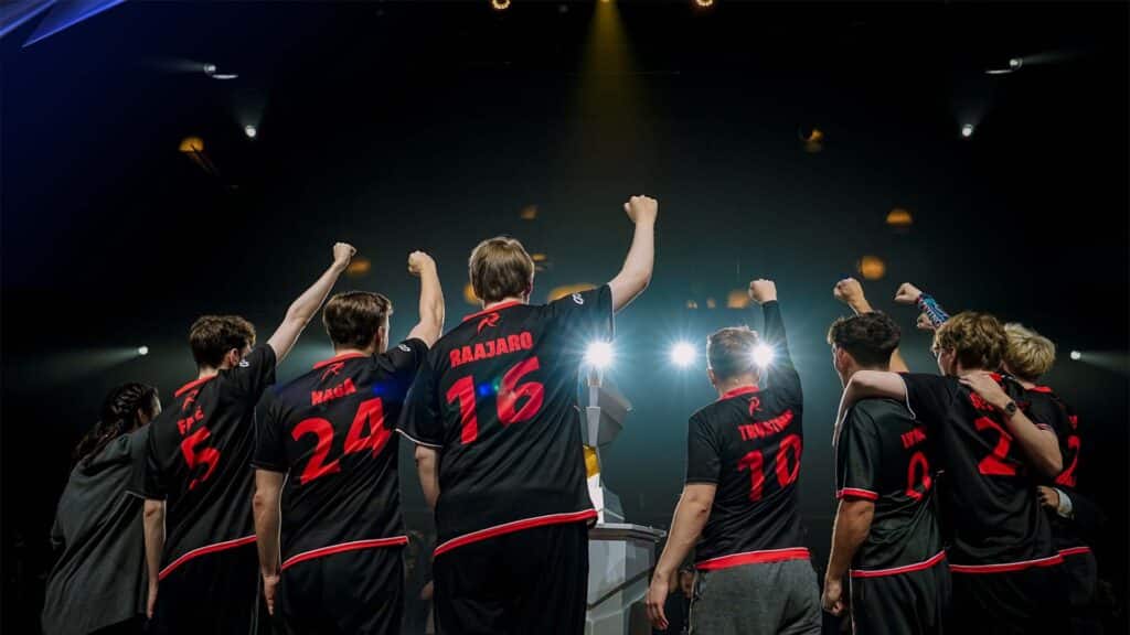 Image of Rad Esports Marvel Rivals team posing with fists in the air
