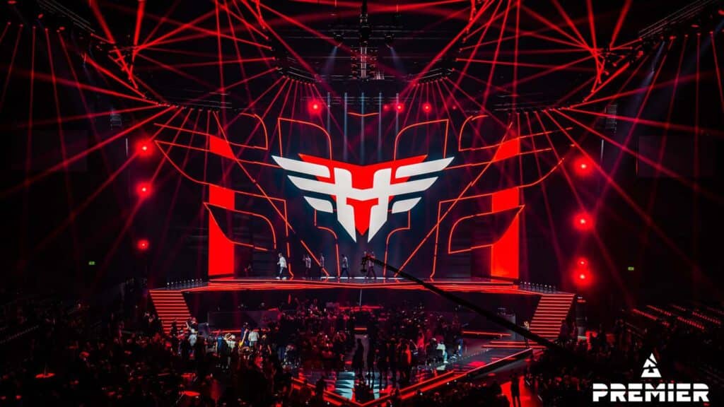 Image of HEROIC logo projected onto esports stage
