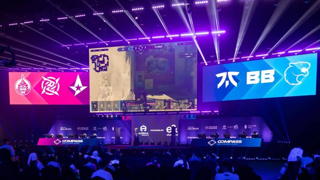 Image of YaLLa Compass stage showing logos of esports organisations and Counter Strike gameplay