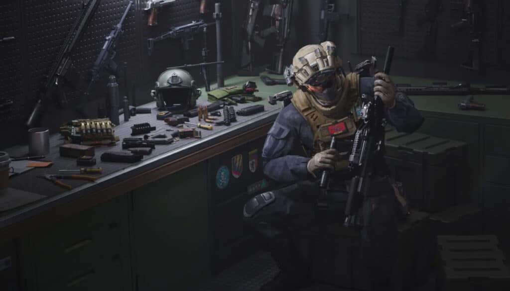 Soldier assembling rifle at workbench