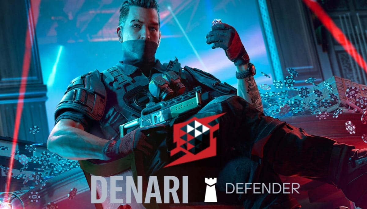 A masked man in tactical gear sits confidently, surrounded by glowing blue chips and red laser beams. Words "DENARI" and "DEFENDER" are displayed