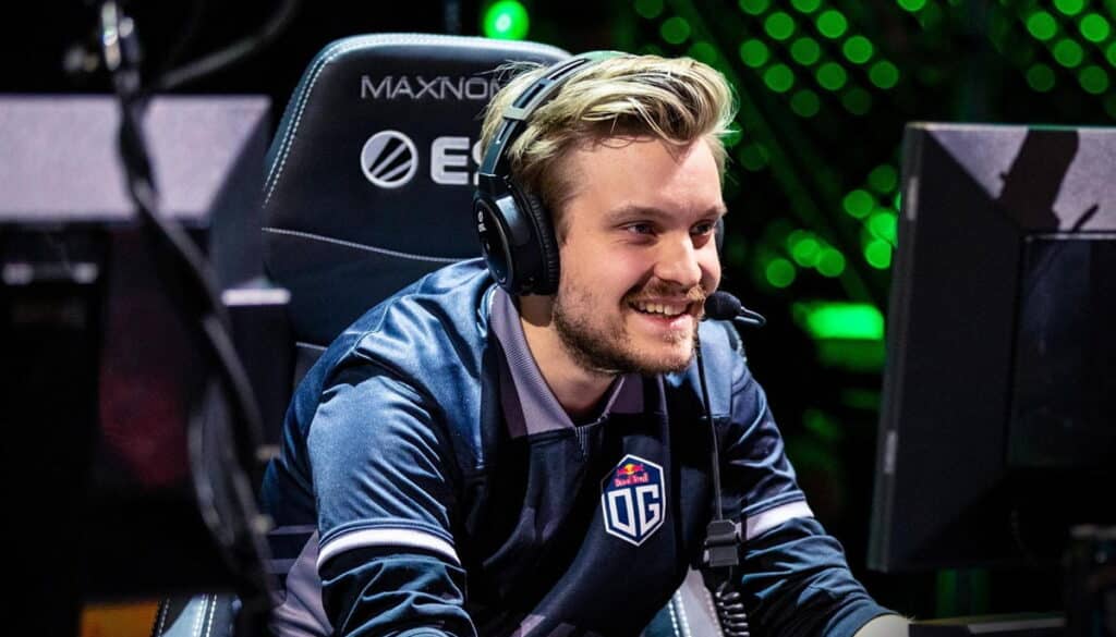 JerAx wearing headset smiling during esports match