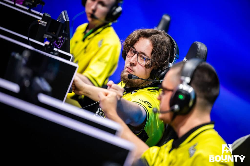 Image of Counter-Strike 2 player ZywOo fist bumping team mate while competing at esports event