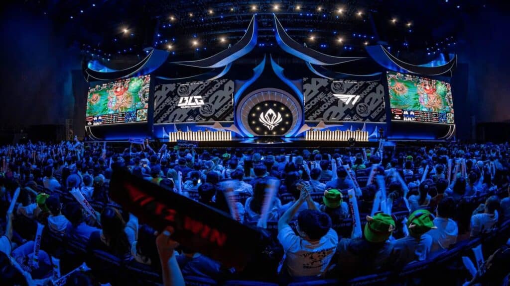 Image of League of Legends esports stage with stage displaying gameplay in background