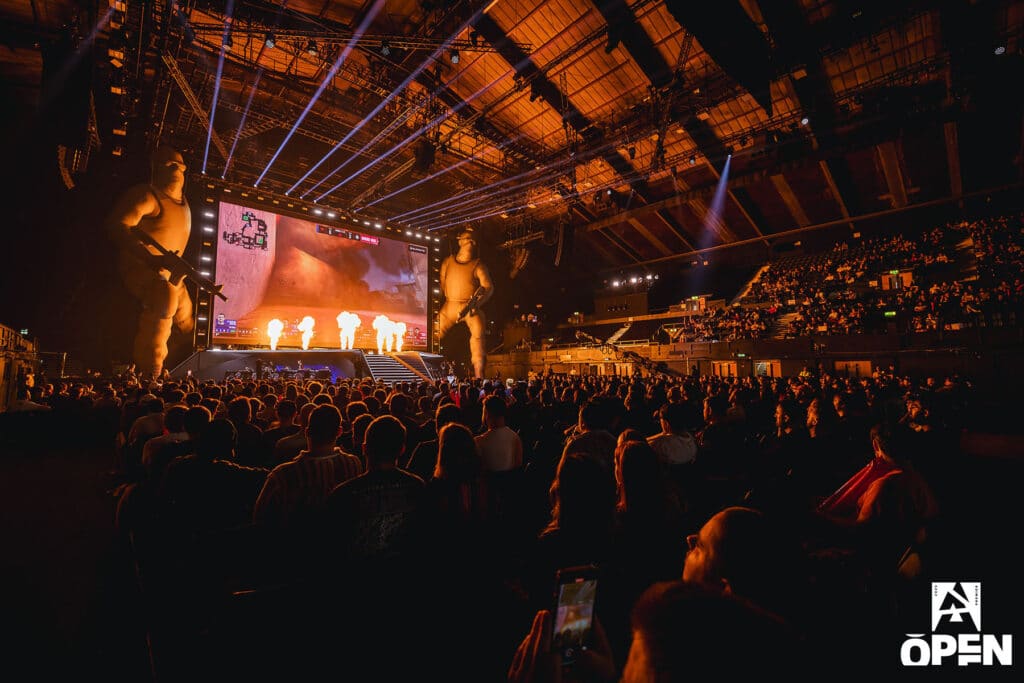 Image of BLAST Premier Open stage illuminated by fire.