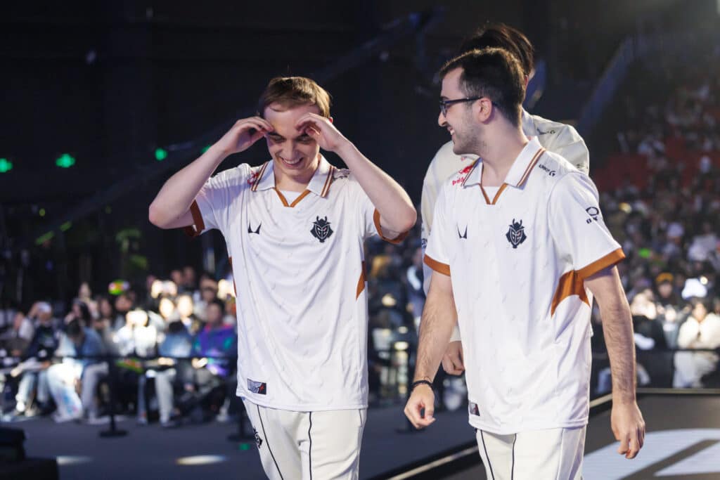 Caps, SkewMond and Hans Sama G2 Esports after victory at League of Legends Worlds 2025 Swiss Stage on October 18, 2025 in Beijing, China. (Photo by Liu YiCun/Riot Games)