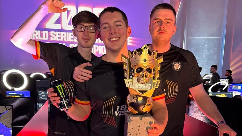 Image of Team Vision holding World Series of Warzone trophy. Fifakill (centre) is holding a black and green can of Monster Energy