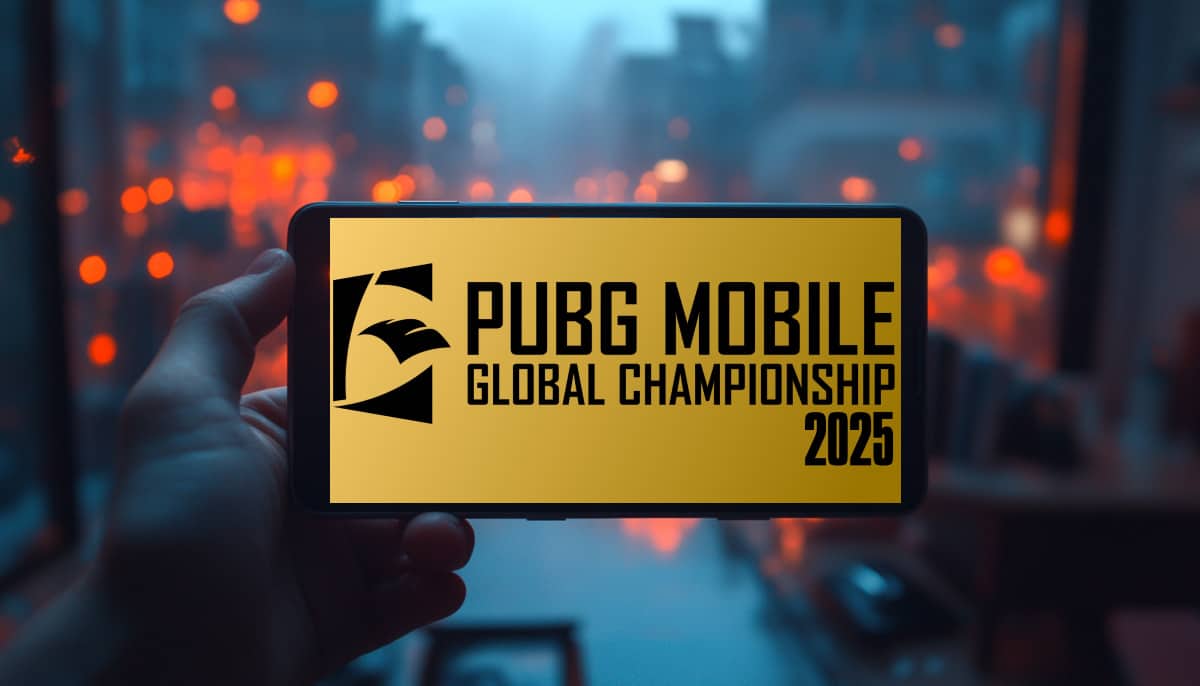 A hand holds a smartphone displaying "PUBG Mobile Global Championship 2025" on a yellow screen