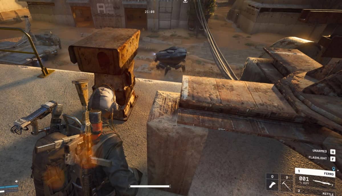 A soldier crouches on a dusty rooftop at sunset, overlooking a desolate landscape with abandoned vehicles in Arc Raiders