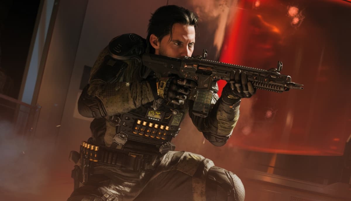 A soldier in tactical gear crouches, aiming an assault rifle with determination in Black Ops 7