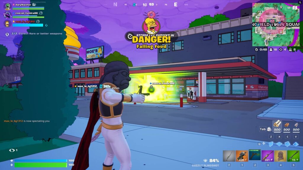 Fortnite character in a white suit aims a gun in front of a building with "Moe's" sign