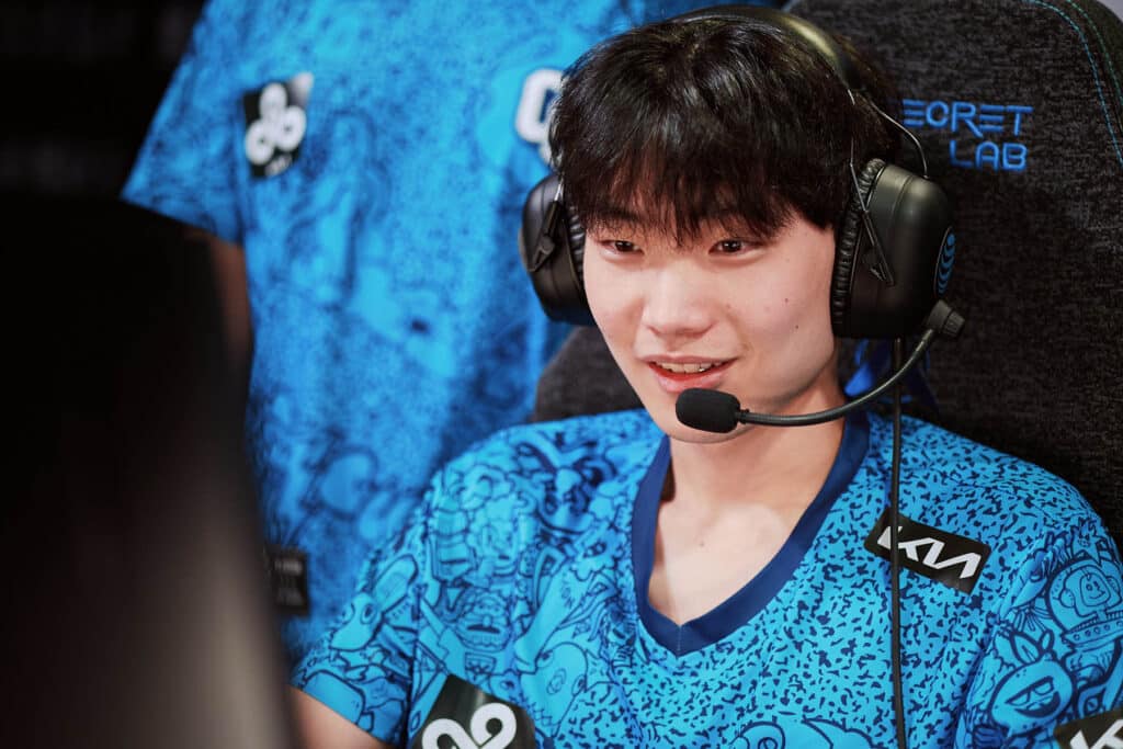 Image of League of Legends player Loki wearing a Cloud9 jersey and a headset while competing in esports competition