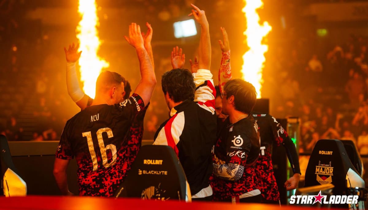 The image shows the FaZe Clan esports team celebrating their victory at the IEM Cologne 2022 tournament in Counter-Strike: Global Offensive (CS:GO)