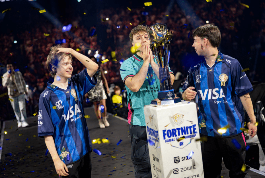 FNCS Global Championship 2025 Grand Finals featuring the winning trio and trophy in France.