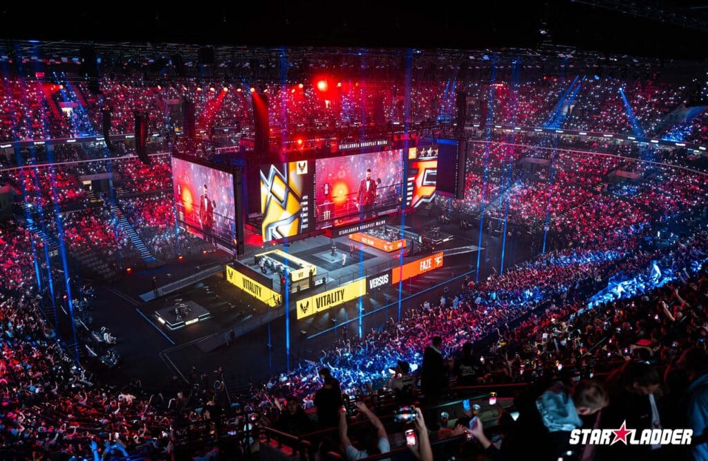 Image of StarLadder Budapest Major 2025 stage with fans shining lights