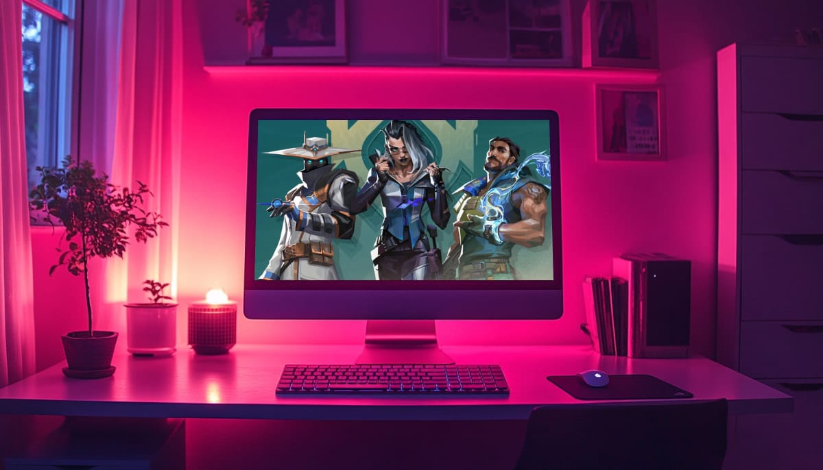 The computer screen displays the game Valorant. The image features three agents (characters) from the game: Cypher (left), Fade (center), and Harbor (right)