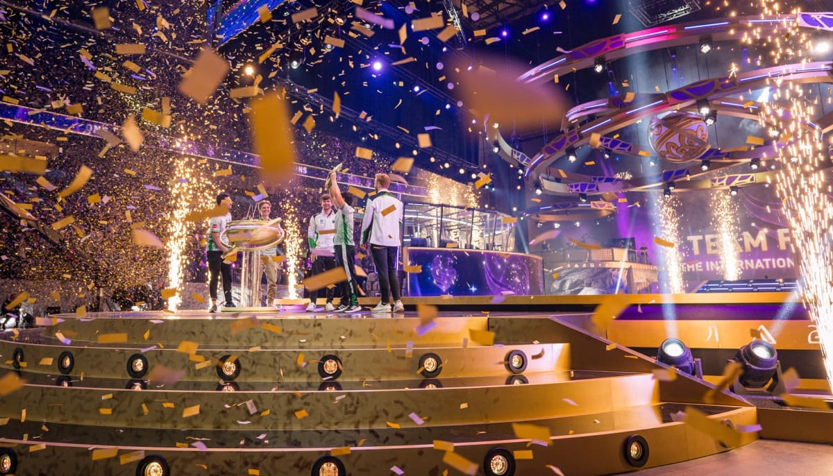 The picture captures the victory celebration of Team Liquid at The International 2017 esports tournament