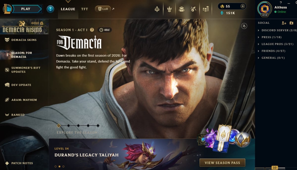 A screenshot of the Riot Games client homepage, featuring a large splash art of the champion Garen, advertising the 'Season 1: For Demacia' event, and displaying navigation menus for news, social, and game modes like League of Legends, TFT, and LoR