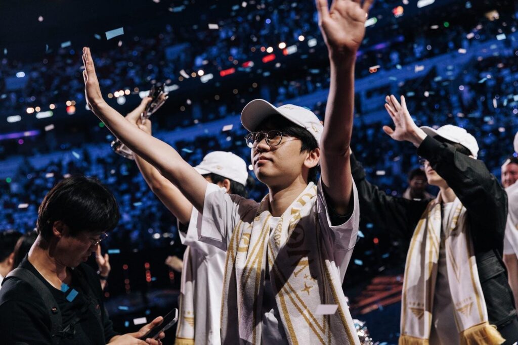 Professional eSports player Doran (Choi Hyeon-jun) of team T1 raises his hands in celebration after winning the League of Legends World Championship
