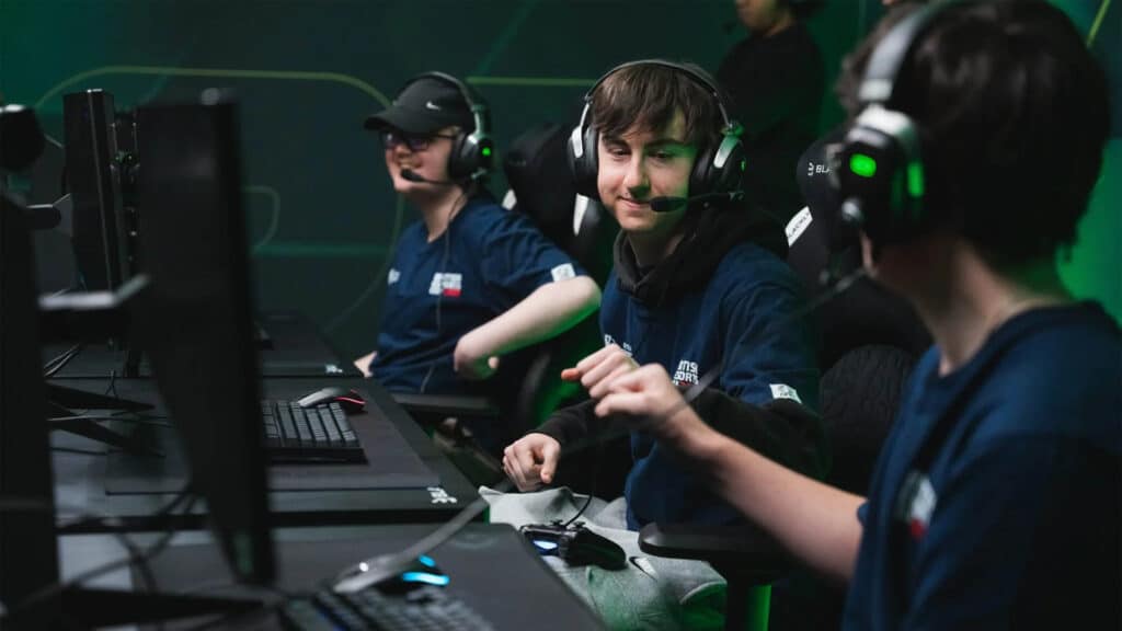 Image of British Esports players fist bumping while competing at esports event