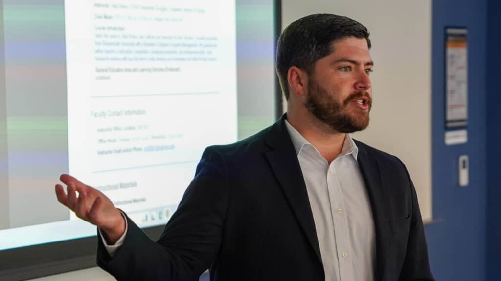 Image of Christopher Scroggins speaking at event