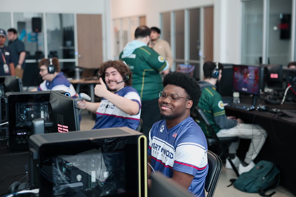 competitive gamers in front of computers