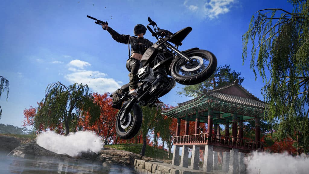 PUBG in-game player riding a motor cycle during a battle royale match