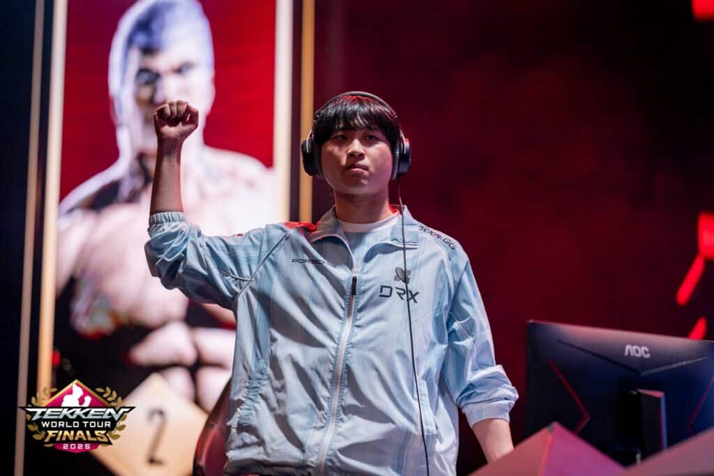 picture of lowhigh with fist raised at tournament