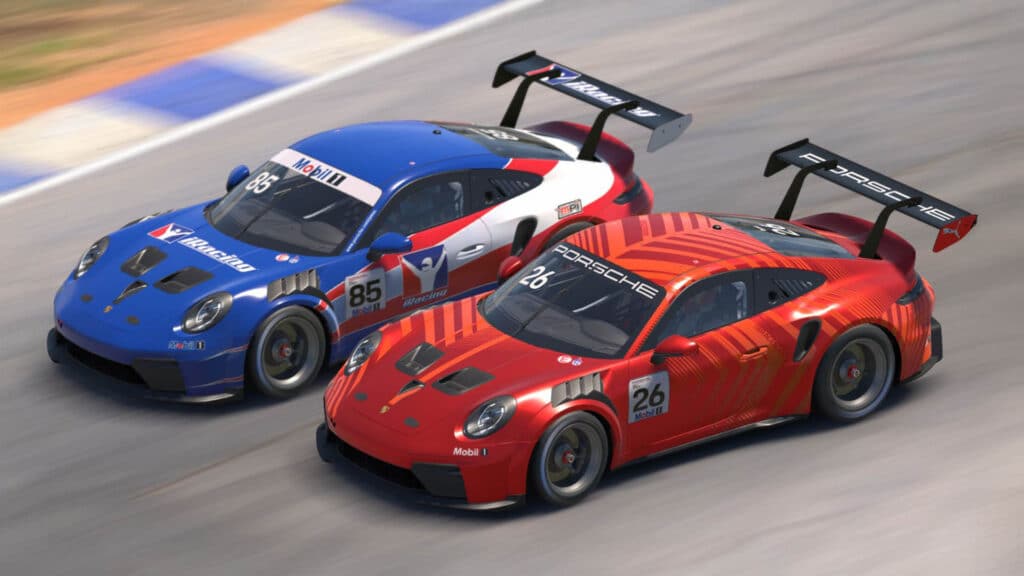 Image of two Porsche Cup cars driving side by side in iRacing. One car is red, white and blue while the other is fully red