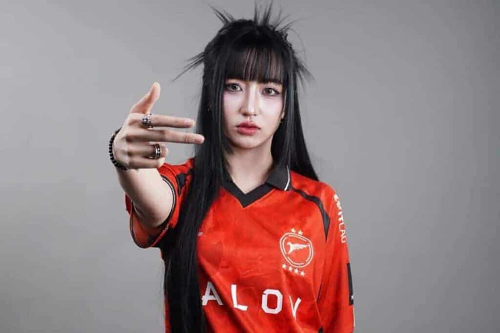 Image of former esports player Tokyogurl posing while wearing TALON Esports jersey